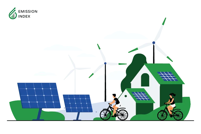 A couple cycling in front of wind turbines and solar panels